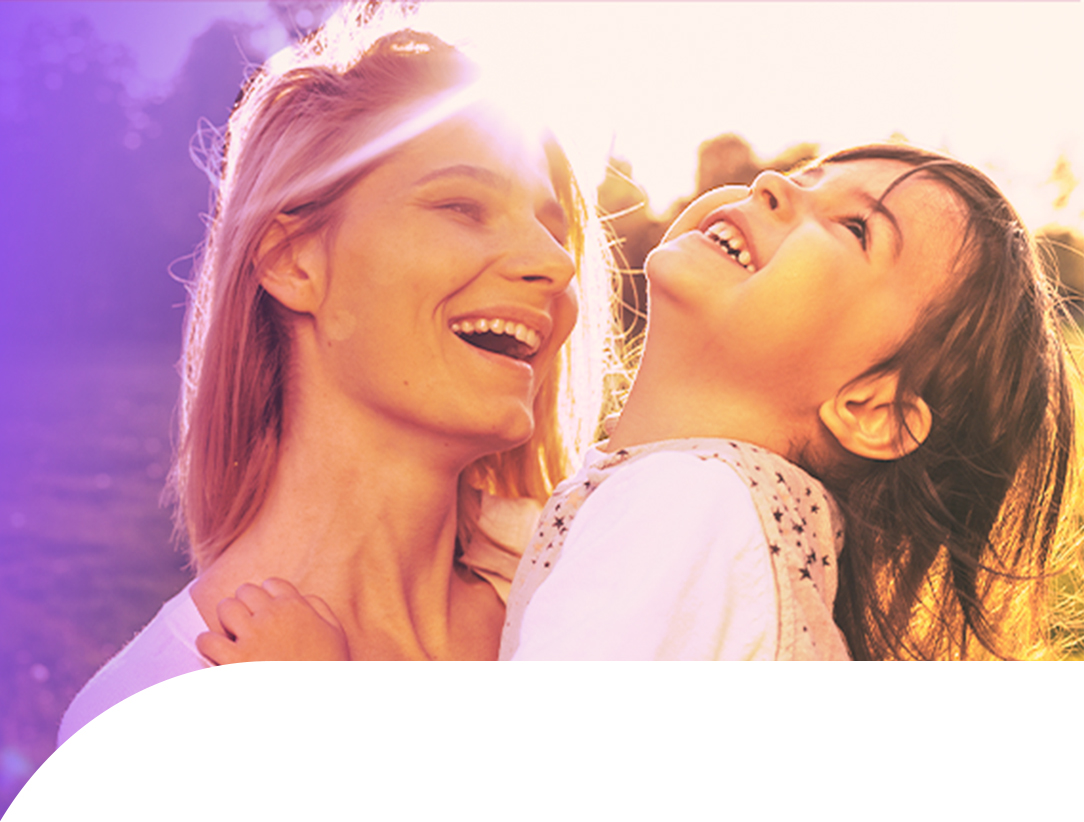 A person with autism viewed from behind standing on an urban street with their back to us.